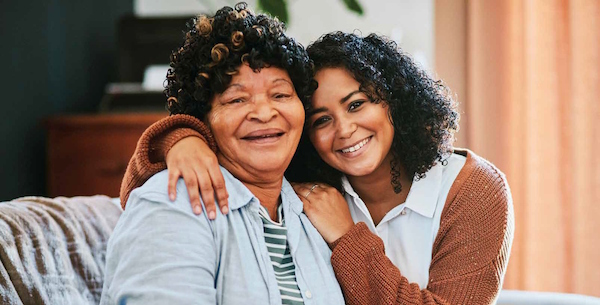 Two women smiling at the camera